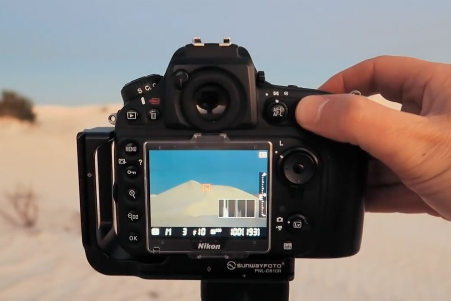 Using Back Button focusing to focus the camera on some sand dunes