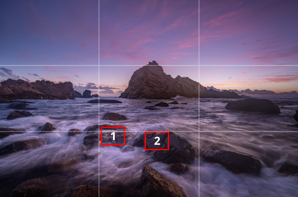 Position 1, has water moving over the rock. Position 2 is a better spot to focus the camera