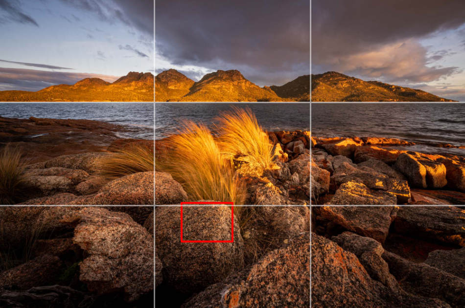 Position the focus point on a rock one-third up the image to ensure the entire scene is in focus