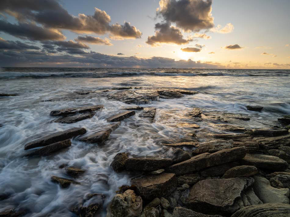 An unedited seascape shot captured with a shutter speed of 1/3 of a  second