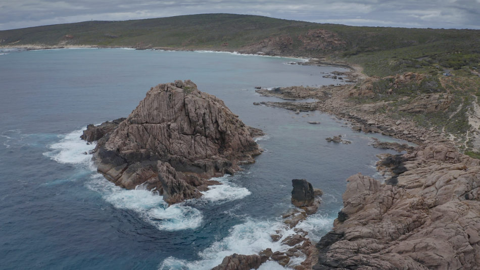 Sugarloaf Rock contains lots of photogenic scenes with waves, rocks, and, views down the coast and a strong main subject.