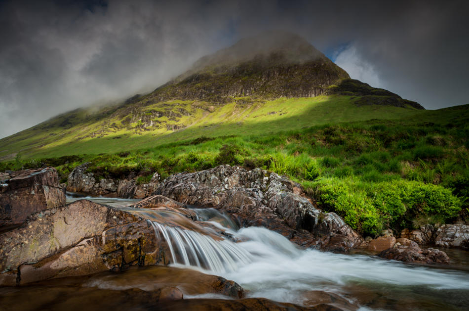 This mountain is Scotland is the main subject but the small cascade in the foreground adds to the story and supports the main feature.