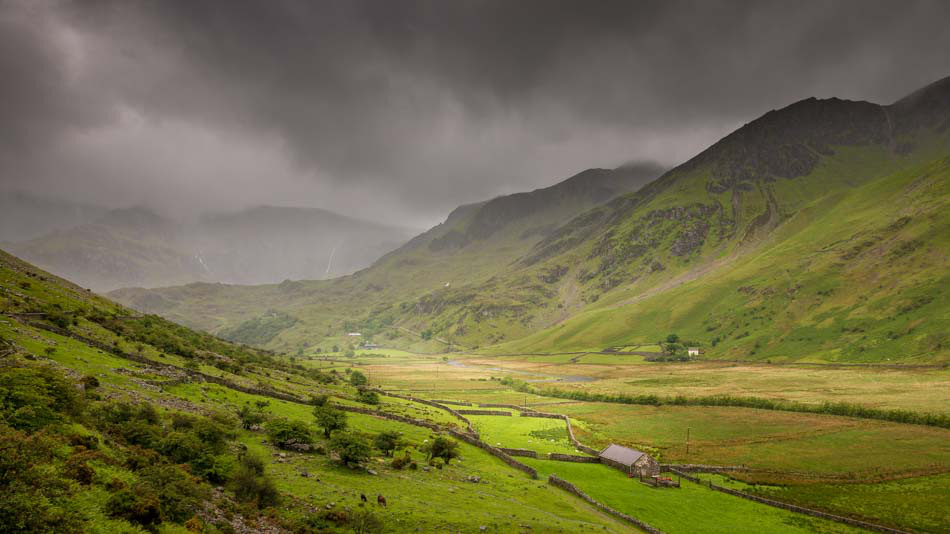 The outline of the mountains create lines leading the eye down the the valley